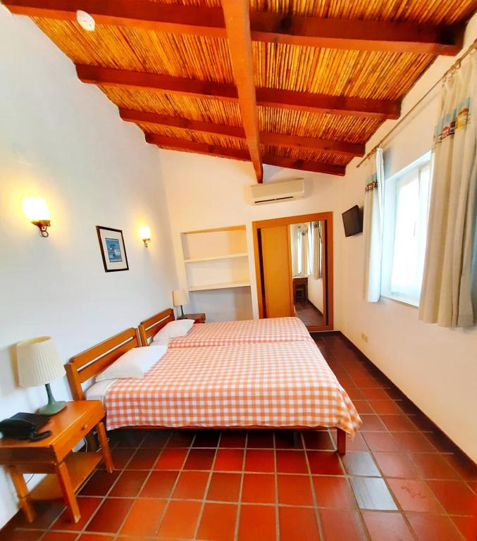 Двухместный (Стандартный двухместный номер с 1 кроватью или 2 отдельными кроватями) гостевого дома Quinta Do Moinho De Vento, Вила-Нова-де-Мильфонт