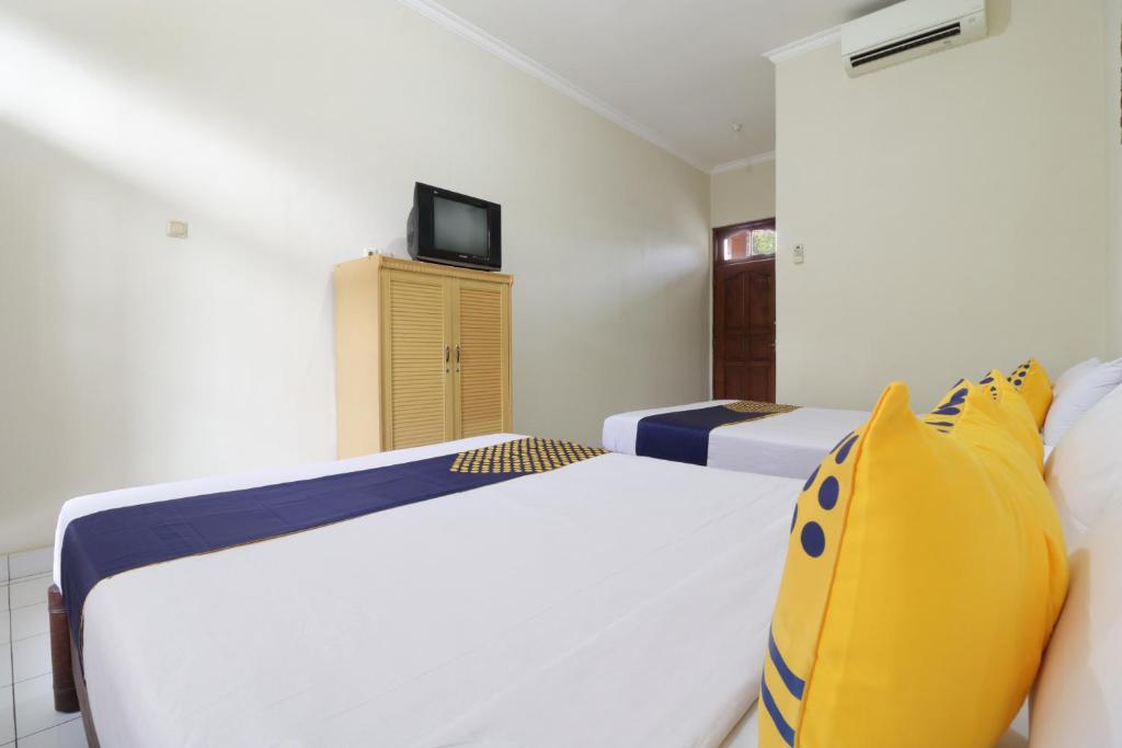 Двухместный (Небольшой двухместный номер с 2 отдельными кроватями) отеля SPOT ON 2426 Hotel Aget Jaya Ii, Денпасар