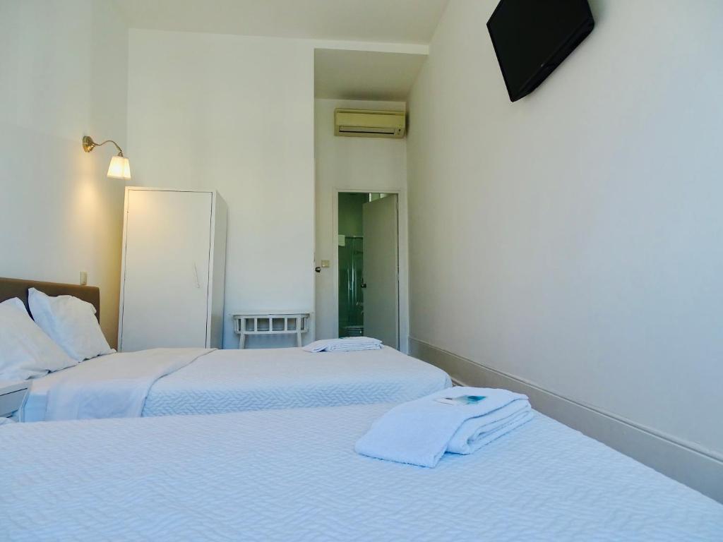 Двухместный (Двухместный номер с 2 отдельными кроватями) отеля Hotel Poveira, Порту