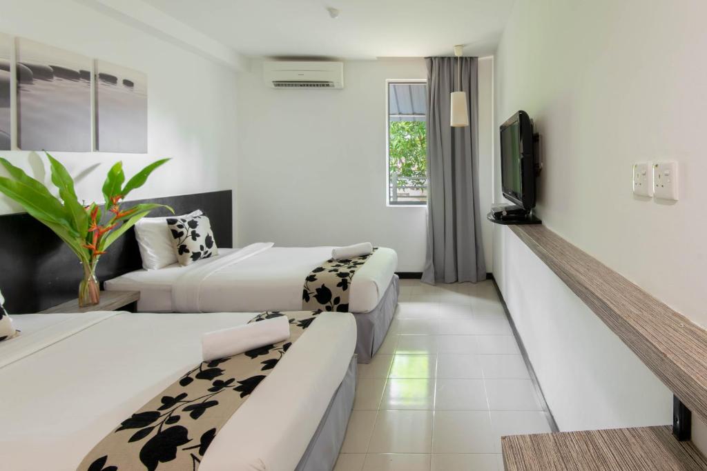Двухместный (Стандартный двухместный номер с 2 отдельными кроватями) отеля Riverra Inn, Лангкави