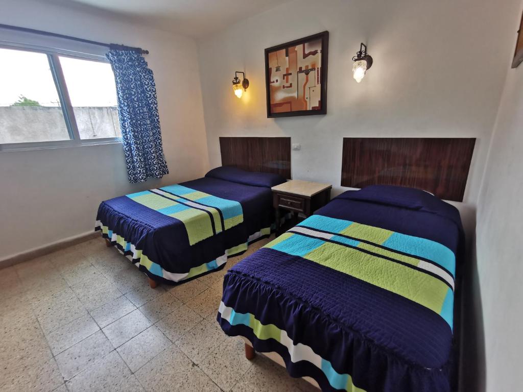 Двухместный (Стандартный двухместный номер с 1 кроватью) отеля Hotel Las Dalias Inn, Мерида