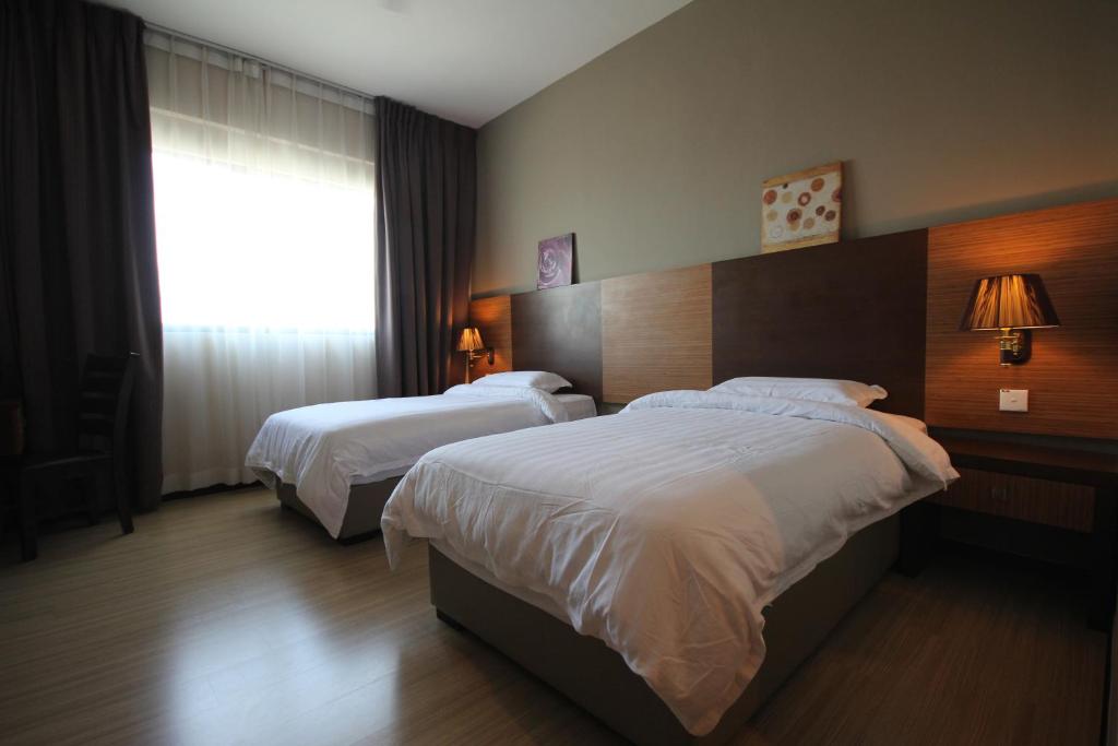 Двухместный (Двухместный номер Делюкс с 2 отдельными кроватями) отеля Aroma Hotel, Пенанг