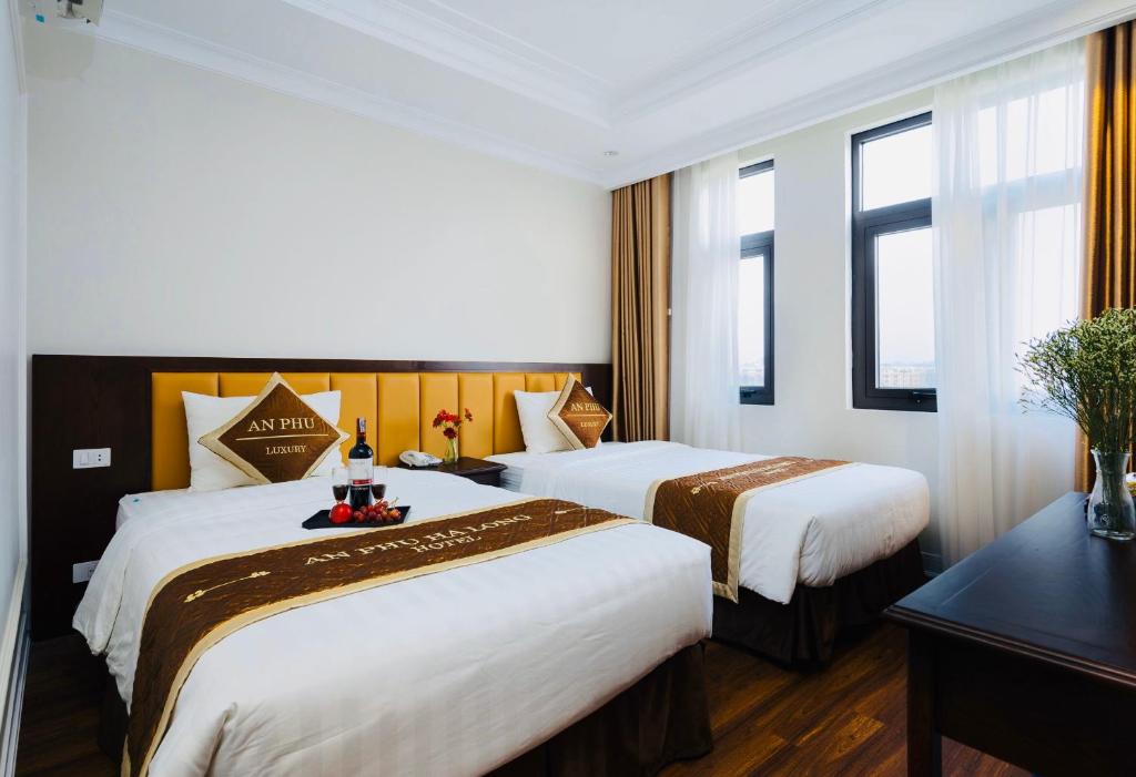 Двухместный (Улучшенный двухместный номер с 2 отдельными кроватями) отеля An Phú Hạ Long Luxury Hotel, Халонг