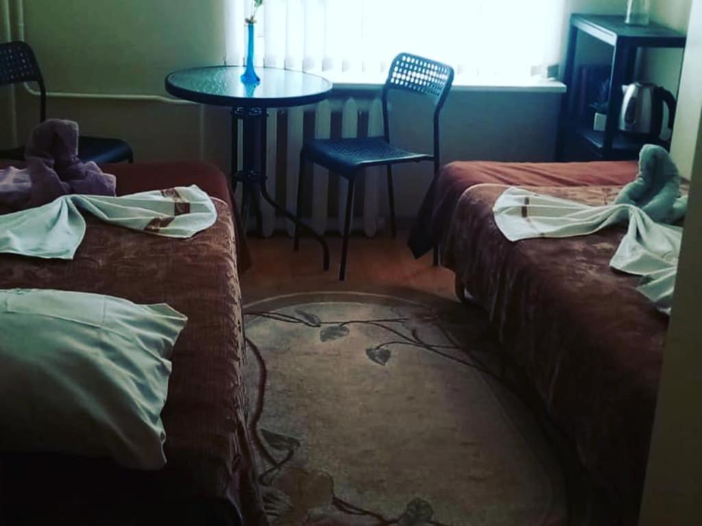 Двухместный (Бюджетный двухместный номер с 2 отдельными кроватями) хостела Jovena Hostel, Вильнюс