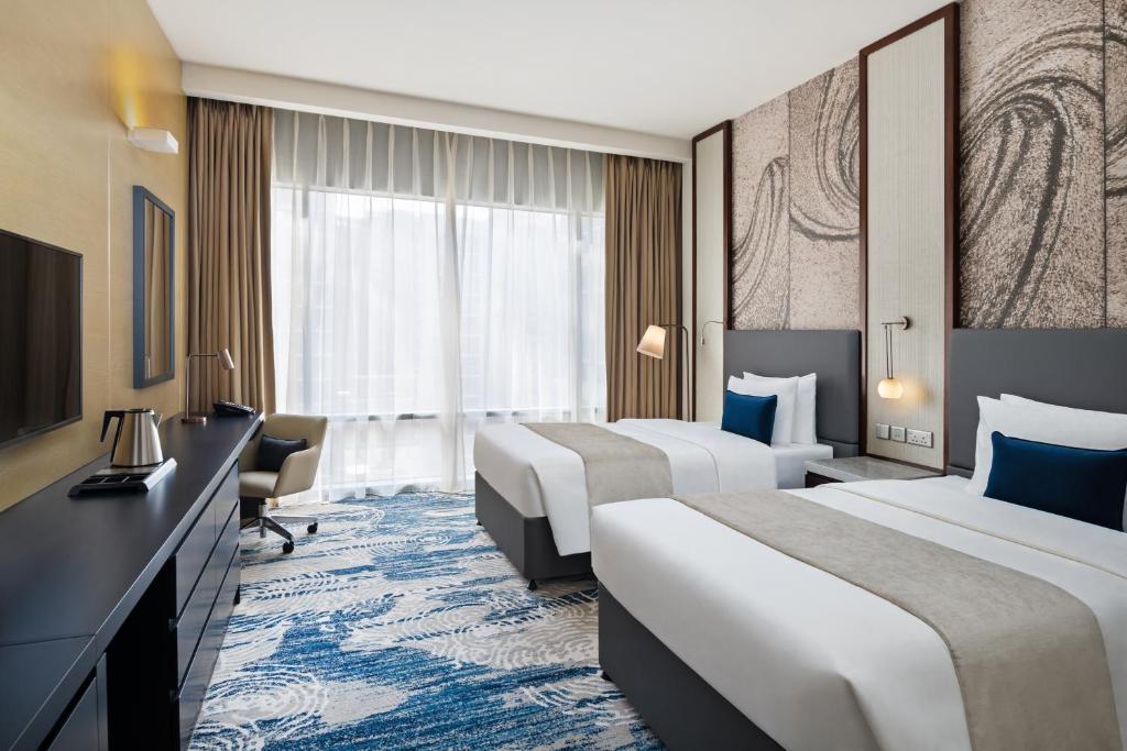 Двухместный (Двухместный номер Делюкс с 2 отдельными кроватями и видом на море) отеля Wyndham Dubai Deira, Дубай