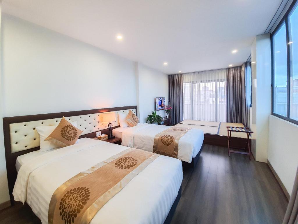 Двухместный (Двухместный номер с 2 отдельными кроватями и собственной ванной комнатой) отеля REIWA INN APARTMENT, Ханой
