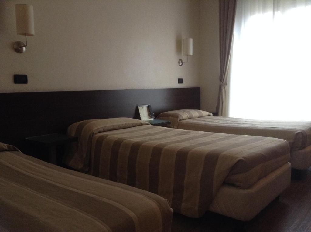 Трехместный (Трехместный номер) отеля Hotel Fiera, Болонья
