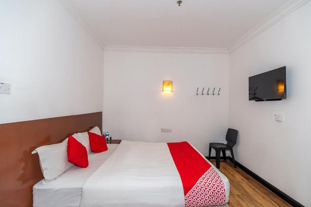 Двухместный (Стандартный двухместный номер с 1 кроватью) отеля OYO 89847 Switz Paradise Hotel, Кота-Кинабалу