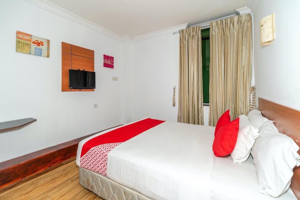 Двухместный (Двухместный номер Делюкс с 1 кроватью) отеля OYO 89847 Switz Paradise Hotel, Кота-Кинабалу