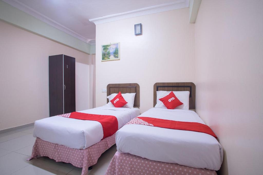 Двухместный (Стандартный двухместный номер с 2 отдельными кроватями) отеля OYO 89363 Casavilla Hotel, Куала-Лумпур