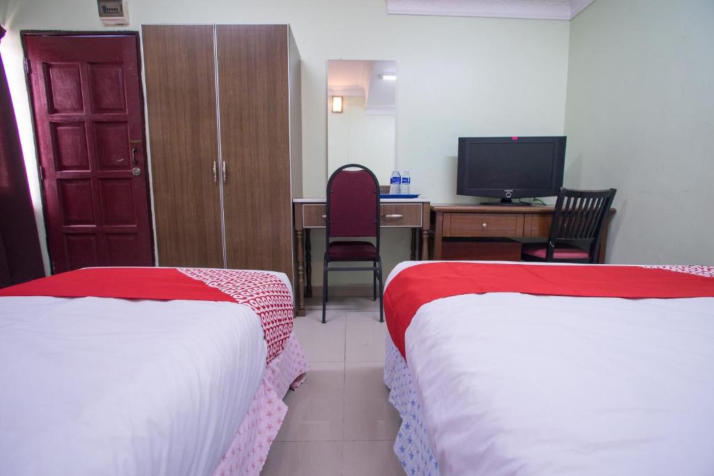 Сьюит (Улучшенный люкс) отеля OYO 89363 Casavilla Hotel, Куала-Лумпур