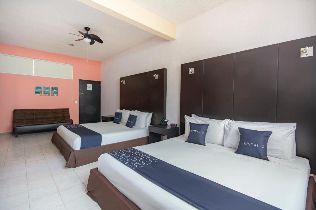 Двухместный (Улучшенный двухместный номер с 2 двуспальными кроватями) отеля Hotel Spa Shalam, Коатепек