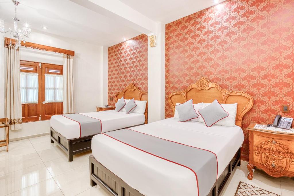 Двухместный (Двухместный номер с 2 отдельными кроватями) отеля Hotel Boutique Casa Garay, Оахака-де-Хуарес
