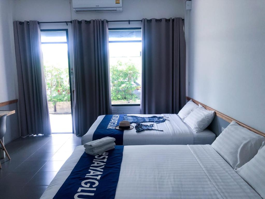 Двухместный (Двухместный номер Делюкс с 2 отдельными кроватями) отеля Glur Phuket Patong Beach, Пхукет