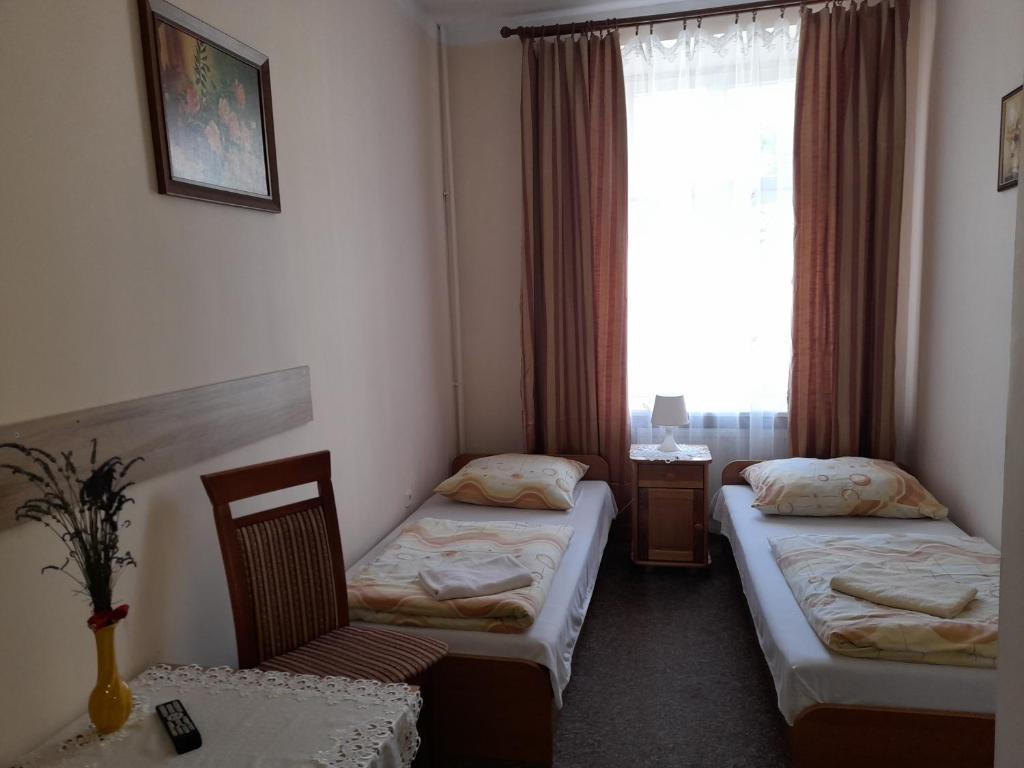 Двухместный (Двухместный номер с 2 отдельными кроватями и ванной комнатой) хостела Green Hostel, Краков
