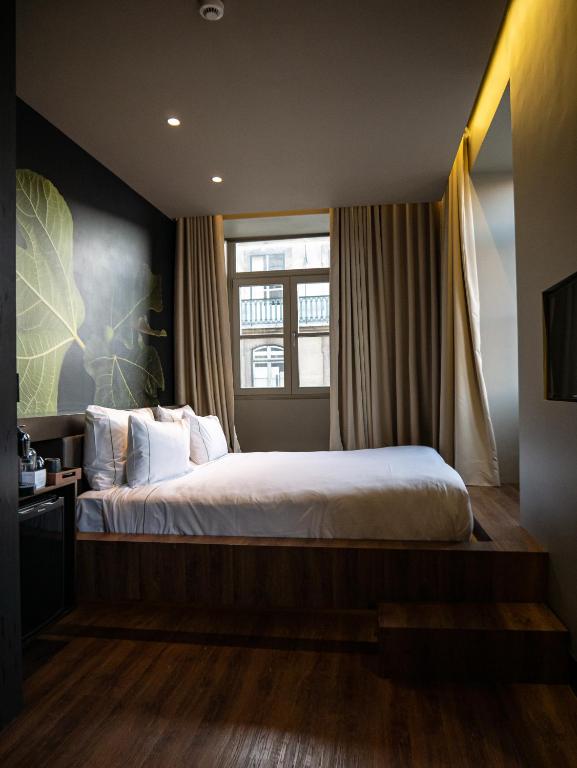 Двухместный (Улучшенный двухместный номер с 1 кроватью или 2 отдельными кроватями) отеля The Beautique Hotels Figueira, Лиссабон