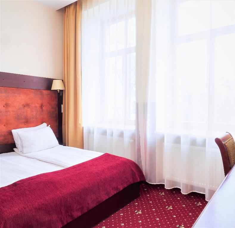 Двухместный (Небольшой двухместный номер с 1 кроватью или 2 отдельными кроватями) отеля Rixwell Old Riga Palace Hotel, Рига