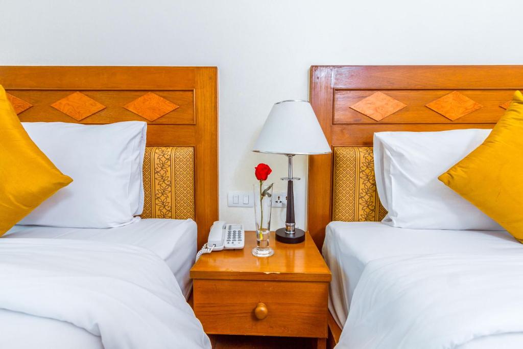 Двухместный (Стандартный двухместный номер с 2 отдельными кроватями) курортного отеля Airport Resort & Spa, Пхукет