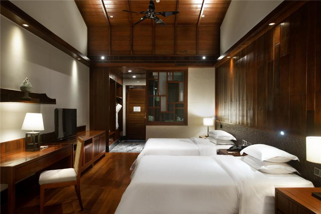 Двухместный (Двухместный номер Yun Peng Делюкс с 2 отдельными кроватями и балконом) отеля Yalong Bay Earthly Paradise Birds Nest Resort, Санья