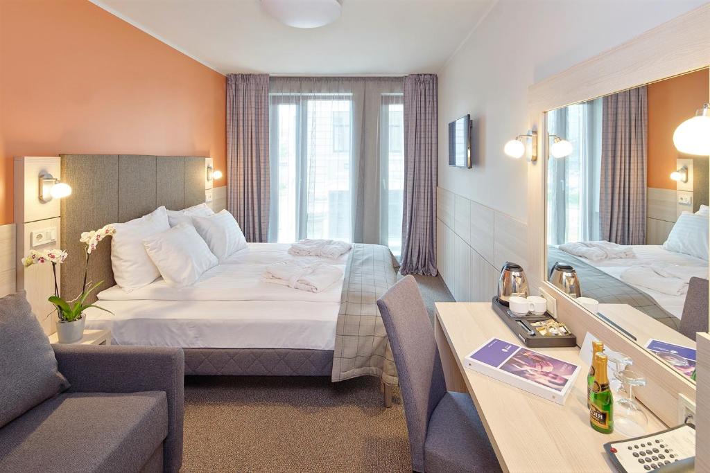 Двухместный (Стандартный двухместный номер с 1 кроватью или 2 отдельными кроватями) отеля Wellton Riga Hotel & SPA, Рига
