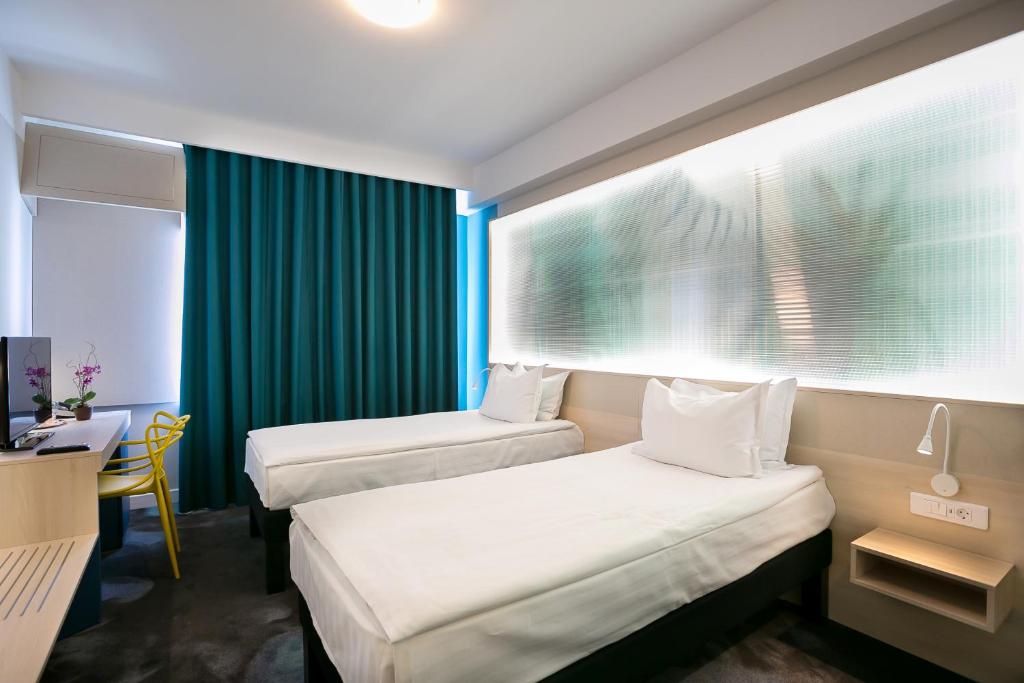 Двухместный (Стандартный двухместный номер с 2 отдельными кроватями) отеля Hotel Danube Stars, Галац