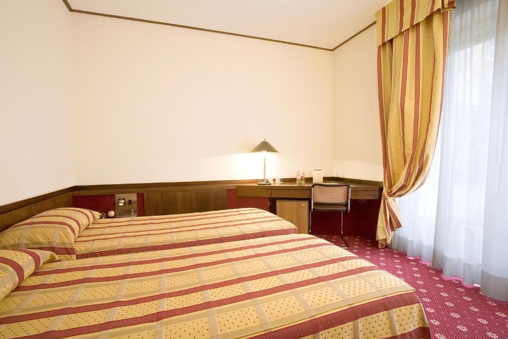Двухместный (Стандартный двухместный номер с 2 отдельными кроватями) отеля Hotel Excelsior San Marco, Бергамо