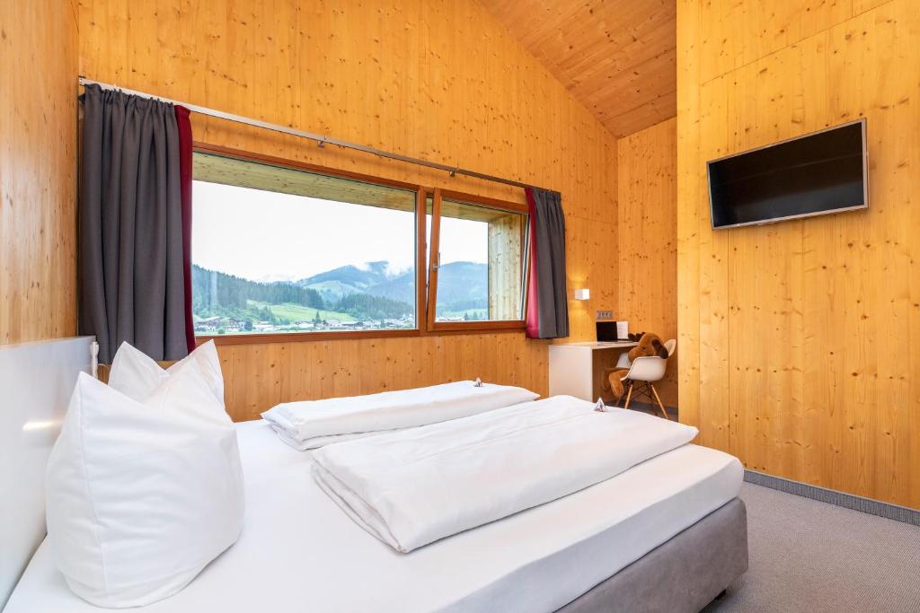 Двухместный (Улучшенный двухместный номер с 2 отдельными кроватями) отеля Haus Deutinger Hotel near the ski resort, Флахау