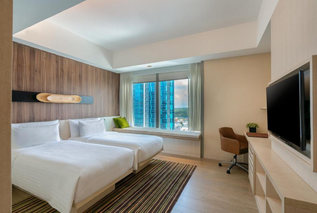 Двухместный (Улучшенный двухместный номер с 1 кроватью или 2 отдельными кроватями) отеля Oasia Hotel Novena, Singapore by Far East Hospitality, Сингапур (город)