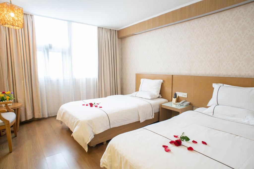Двухместный (Стандартный двухместный номер с 2 отдельными кроватями) отеля Guangzhou Xin Yue Xin Hotel, Гуанчжоу