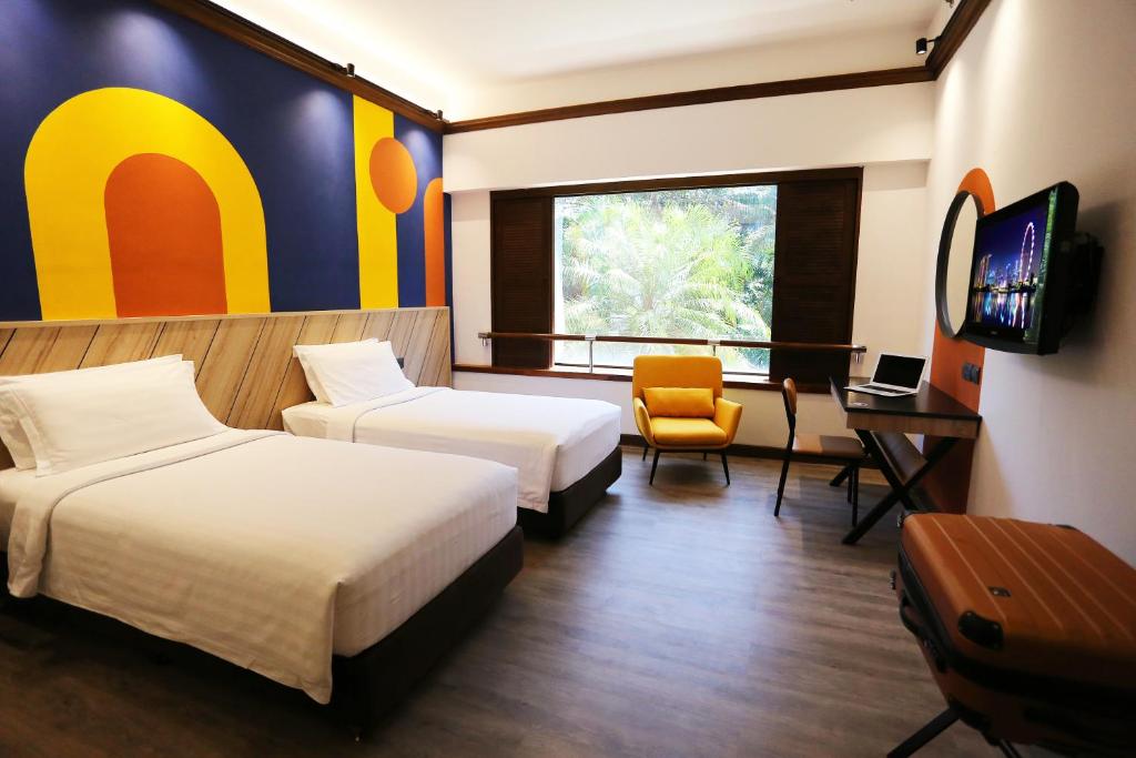 Двухместный (Deluxe Tropical Double or Twin Room) отеля Furama RiverFront, Сингапур (город)