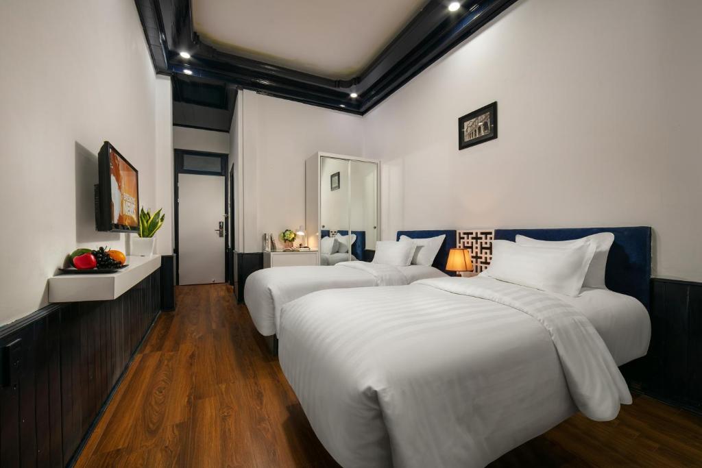 Двухместный (Стандартный двухместный номер с 1 кроватью или 2 отдельными кроватями) отеля Maison D'Hanoi Boutique Hotel, Ханой