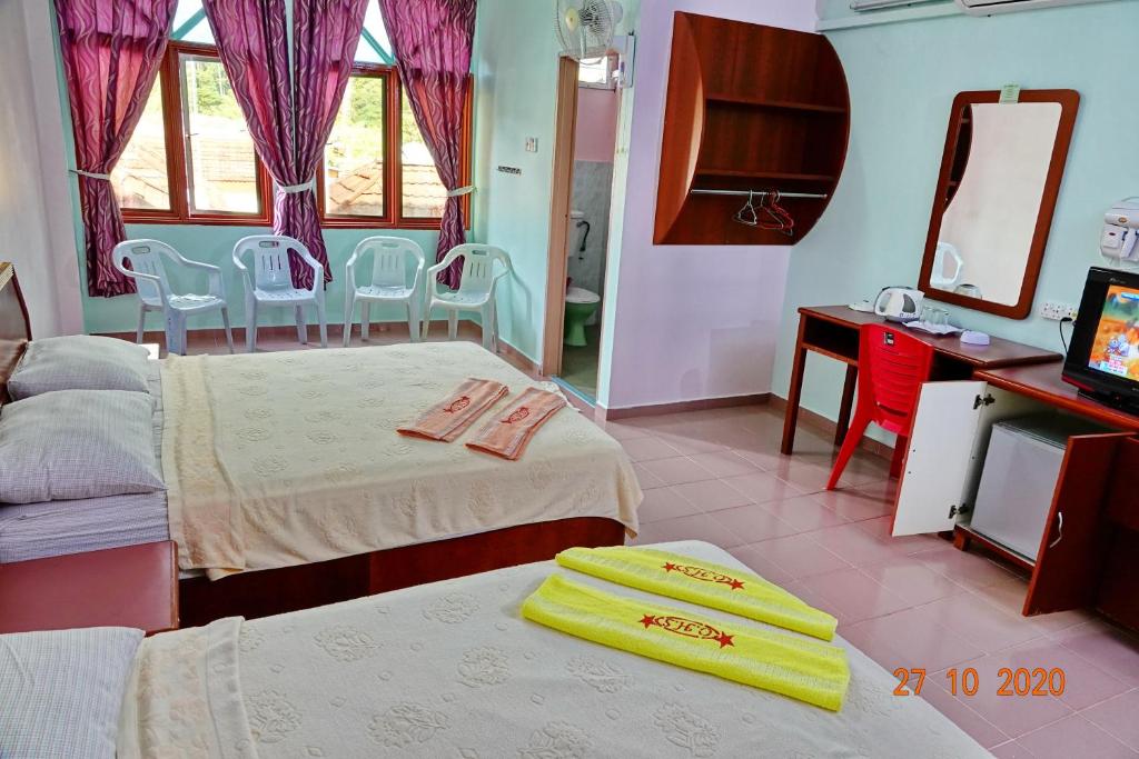 Четырехместный (Четырехместный номер) семейного отеля Ong Homestay, Лангкави