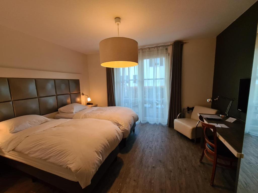 Двухместный (Стандартный двухместный номер с 2 отдельными кроватями) отеля Restaurant & Hotel de Sniep, Гаага