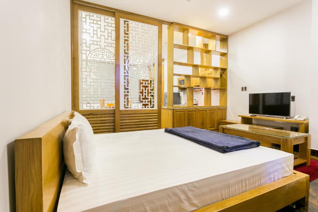 Студио (Двухместный номер-студио Делюкс с 1 кроватью) отеля Kim Minh Apartment & Hotel, Вунгтау