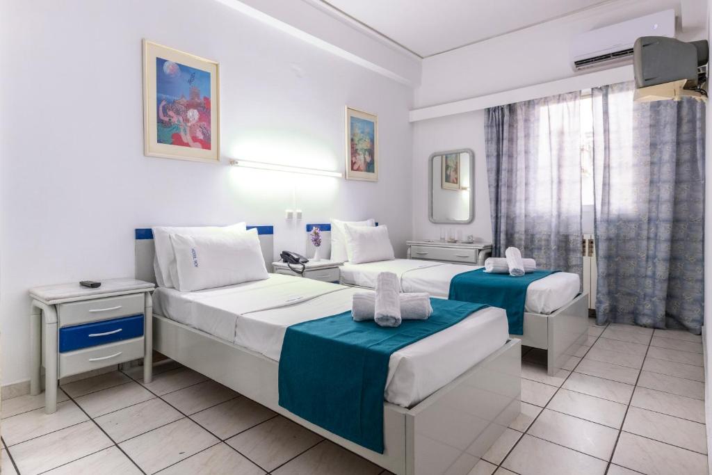Двухместный (Двухместный номер с 2 отдельными кроватями) отеля ROY Hotel, Афины