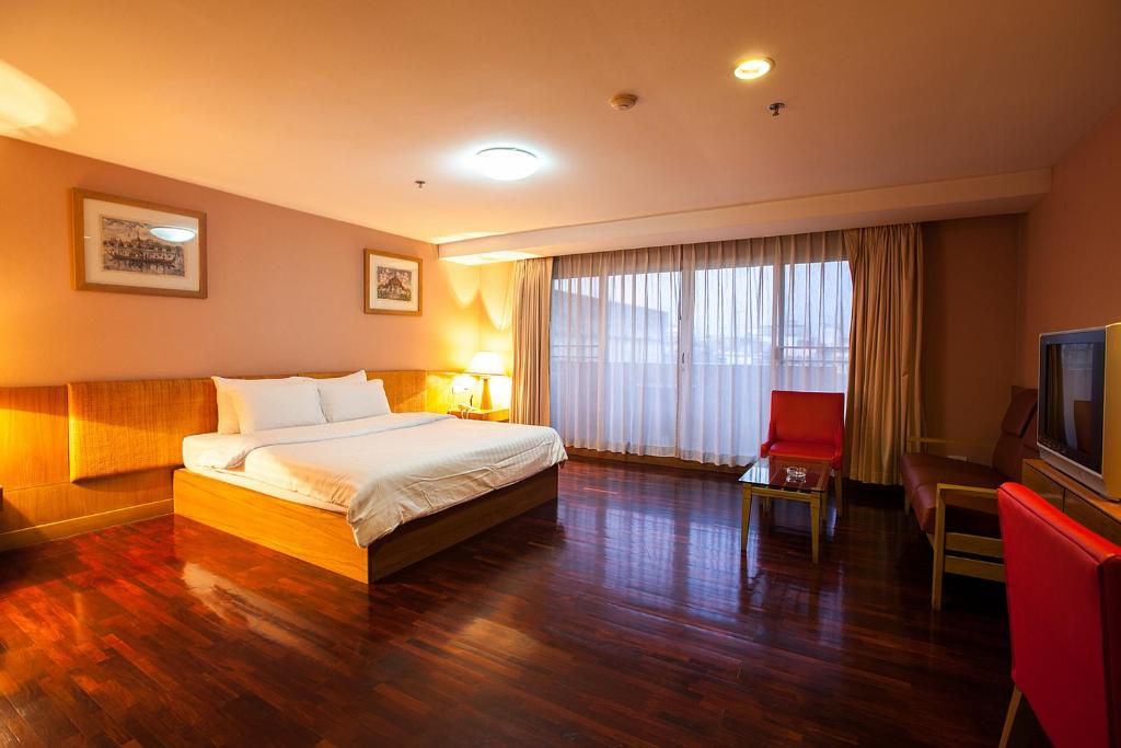 Двухместный (Специальное предложение — Улучшенный двухместный номер с 1 кроватью) отеля The Aiyapura Bangkok, Бангкок