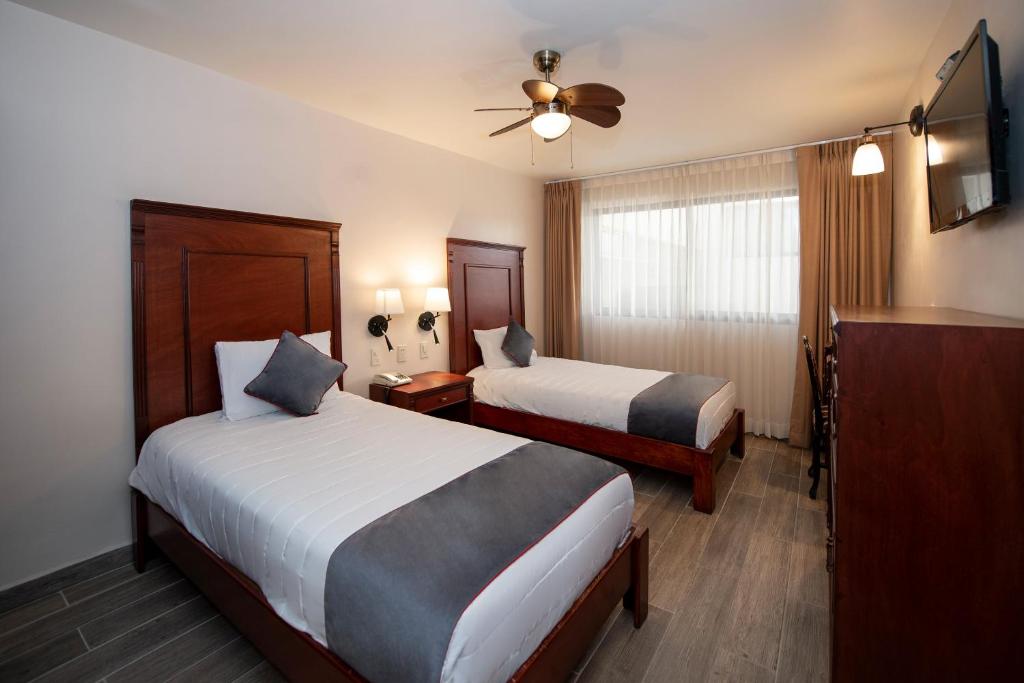Двухместный (Стандартный двухместный номер с 1 кроватью или 2 отдельными кроватями) отеля Hotel Señorial, Керетаро
