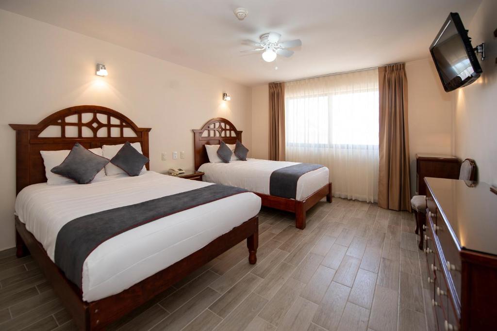 Двухместный (Двухместный номер с 2 двуспальными кроватями) отеля Hotel Señorial, Керетаро