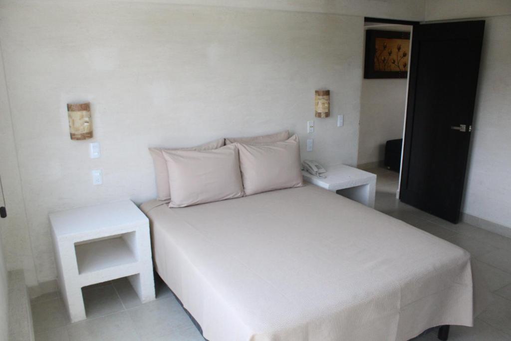 Двухместный (Двухместный номер Делюкс с 1 кроватью) отеля Hotel Coral Cuernavaca Resort & Spa, Темиско