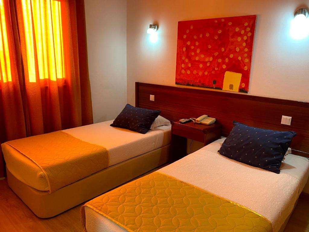 Двухместный (Двухместный номер с 2 отдельными кроватями) отеля Hotel Rubi, Визеу