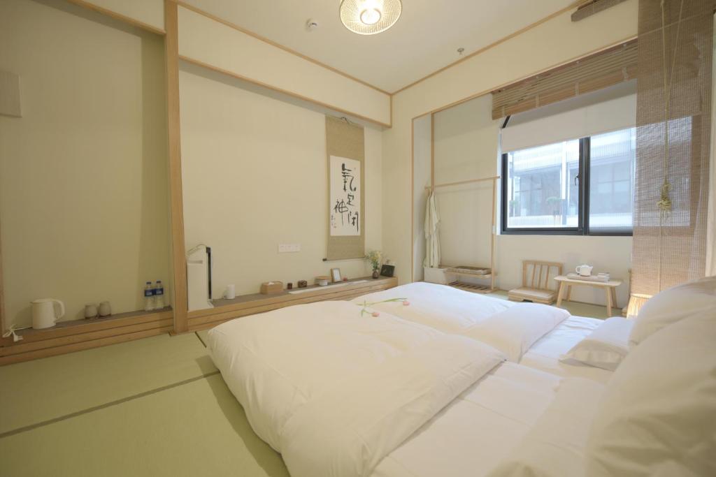 Двухместный (Двухместный номер с 2 отдельными кроватями и ванной) семейного отеля Livo, Шанхай