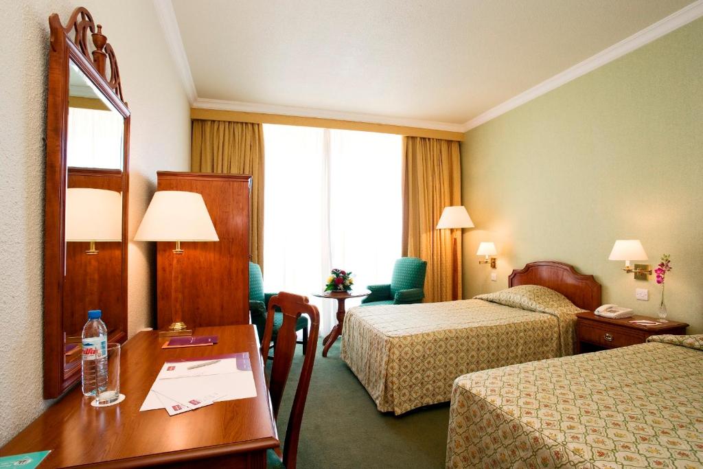 Двухместный (Стандартный двухместный номер с 2 отдельными кроватями) отеля Mercure Grand Hotel, Доха