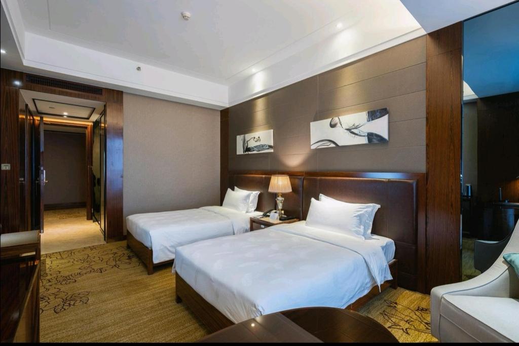 Двухместный (Улучшенный двухместный номер с 2 отдельными кроватями) отеля Honder International Hotel, Гуанчжоу