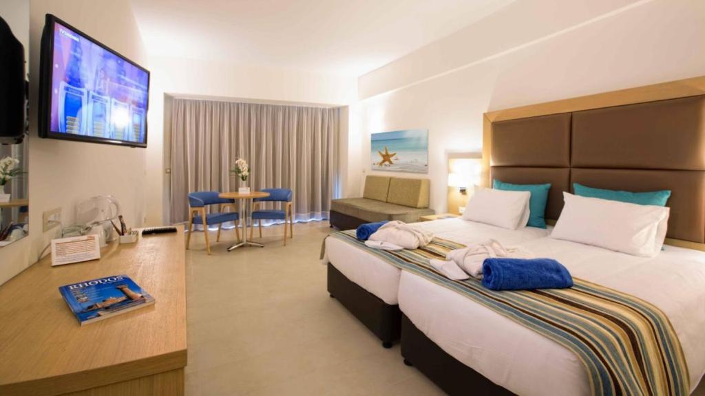 Двухместный (Двухместный номер с 1 кроватью или 2 отдельными кроватями и видом на море) отеля Lti Asterias Beach Resort, Афанту
