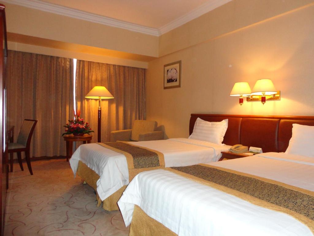 Двухместный (Улучшенный двухместный номер бизнес-класса с 2 отдельными кроватями) отеля Star Hotel, Гуанчжоу