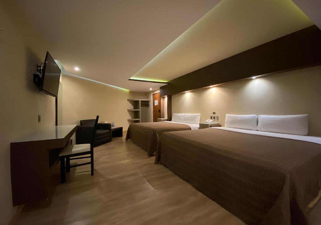 Двухместный (Двухместный номер Делюкс с 2 отдельными кроватями) отеля Hotel Cartagena, Мехико