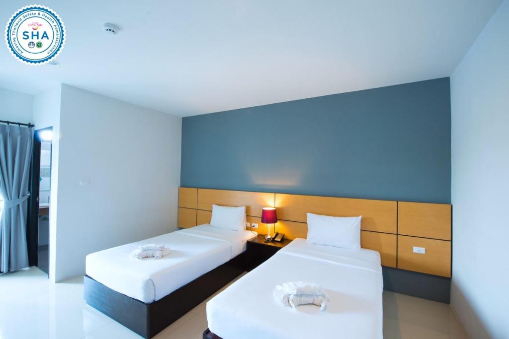 Двухместный (Стандартный двухместный номер с 2 отдельными кроватями) отеля Lee, Сураттхани