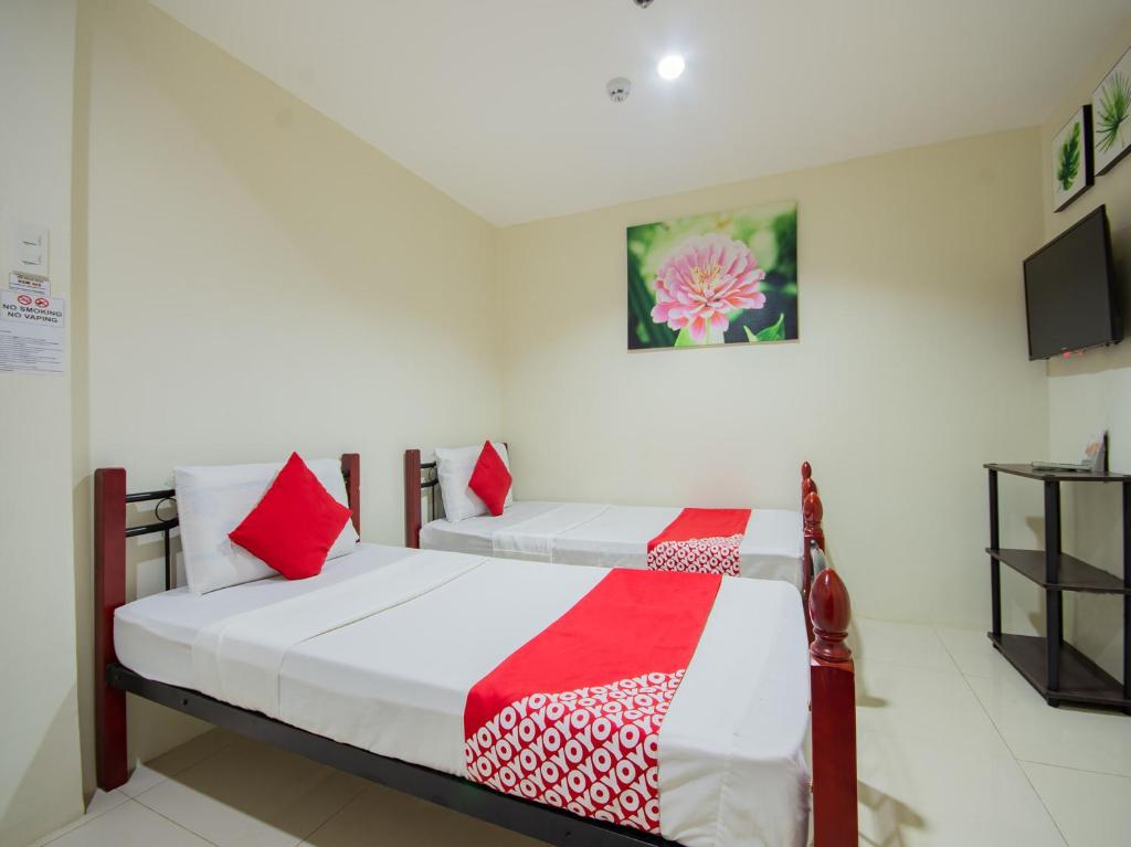 Двухместный (Двухместный номер Делюкс с 2 отдельными кроватями) отеля RedDoorz @ Salinas Extension Lahug, Себу