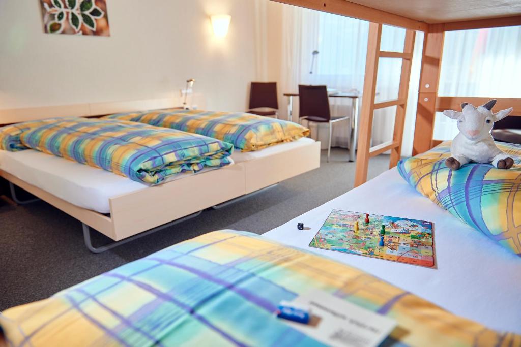 Семейный (Семейный номер (для 2 взрослых и 2 детей)) отеля Hotel Alpina Adelboden, Адельбоден