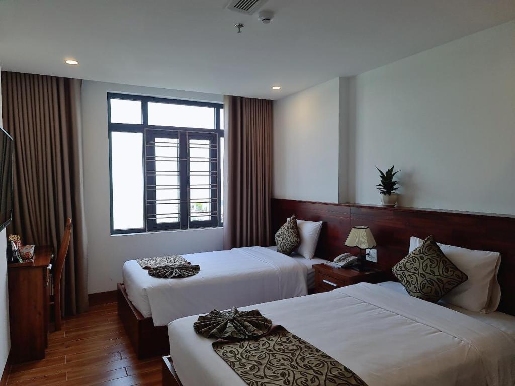 Двухместный (Двухместный номер с 2 отдельными кроватями и видом на море) отеля Ocean View Quy Nhon Hotel, Куинён